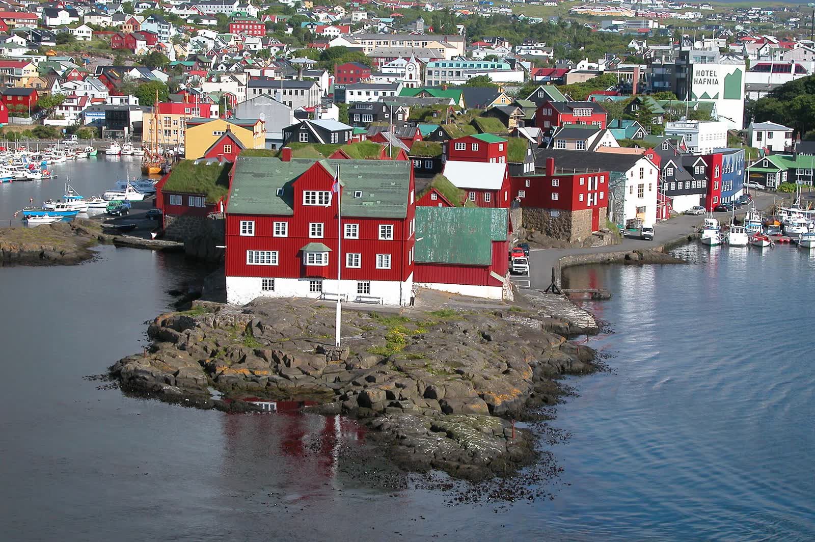 Red turf-roofed buildings on the Tinganes peninsula in Tórshavn, Faroe Islands